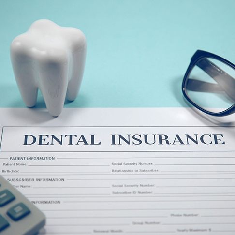 Dental insurance form on blue background