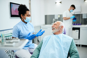 Patient talking to a dentist